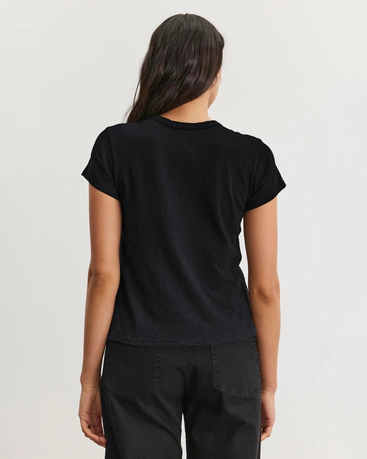 Woman wearing a black cotton slub t-shirt