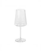 A clear fluted textured wine glass with a solid base, designed for drinking wine.