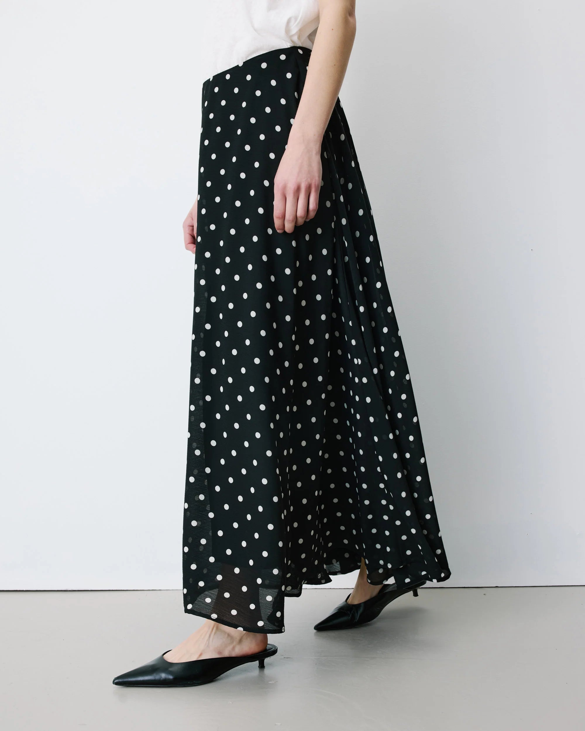 midi black skirt with white polka dots