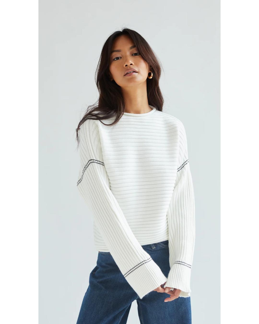 white ribbed sweater