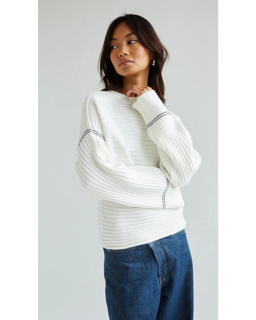 white ribbed sweater