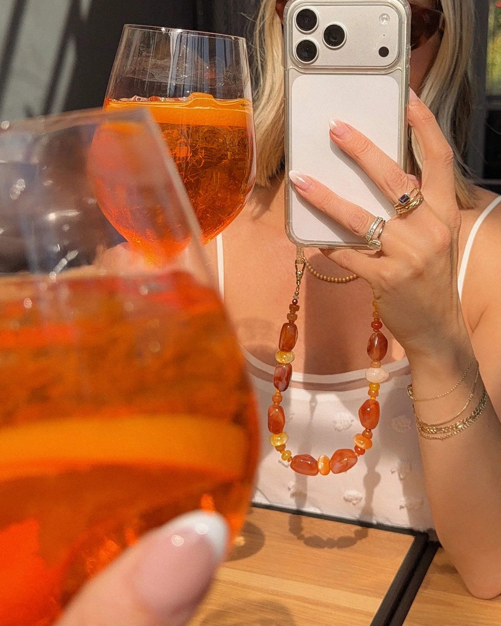 orange beaded phone wristlet