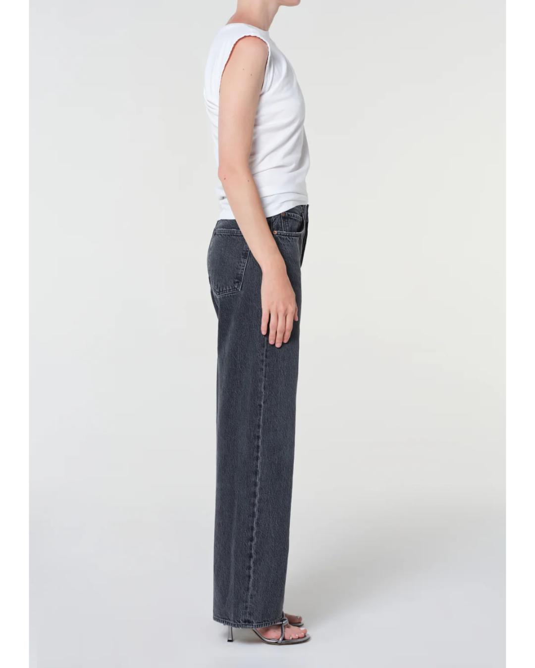 washed black denim pant with a curve leg