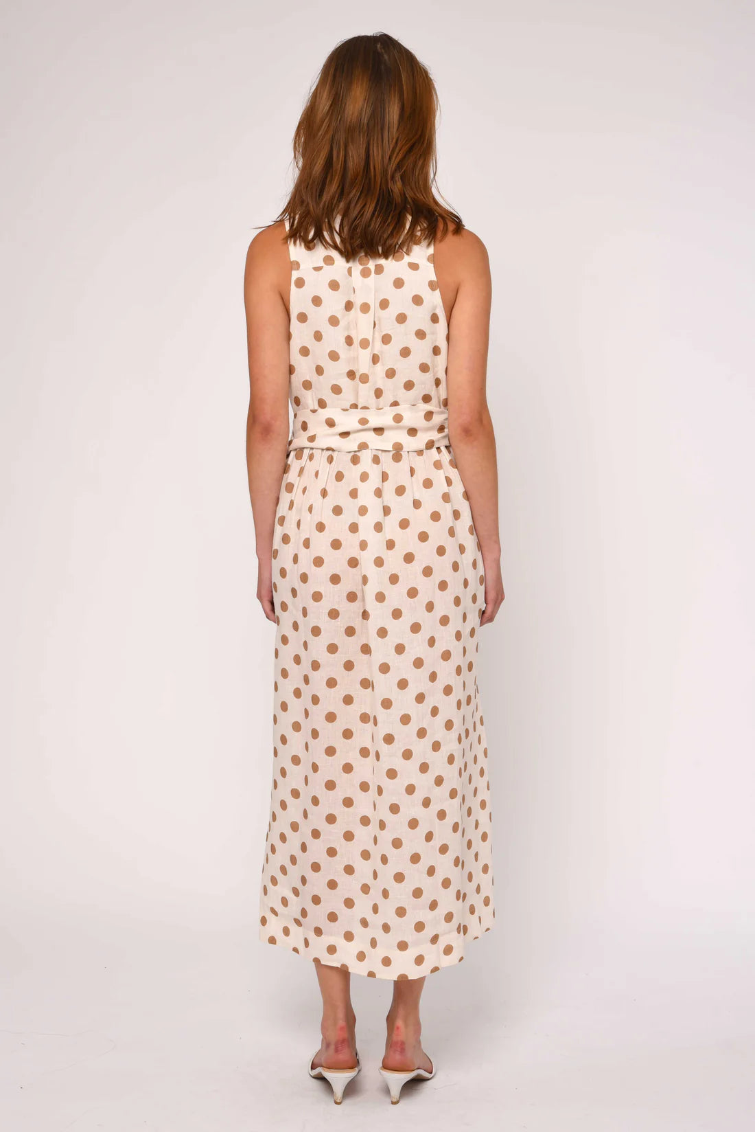 midi polka dot dress in cream and brown with a tie around the waist