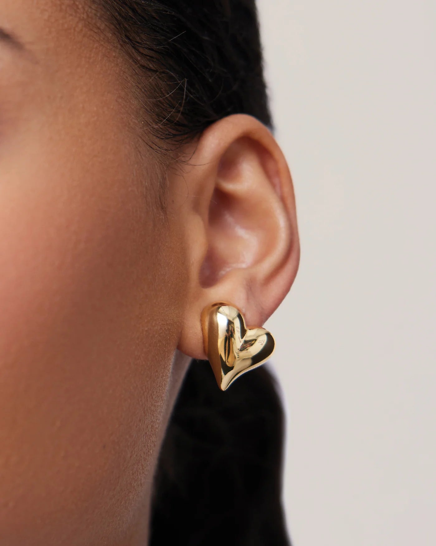 gold heart button earring