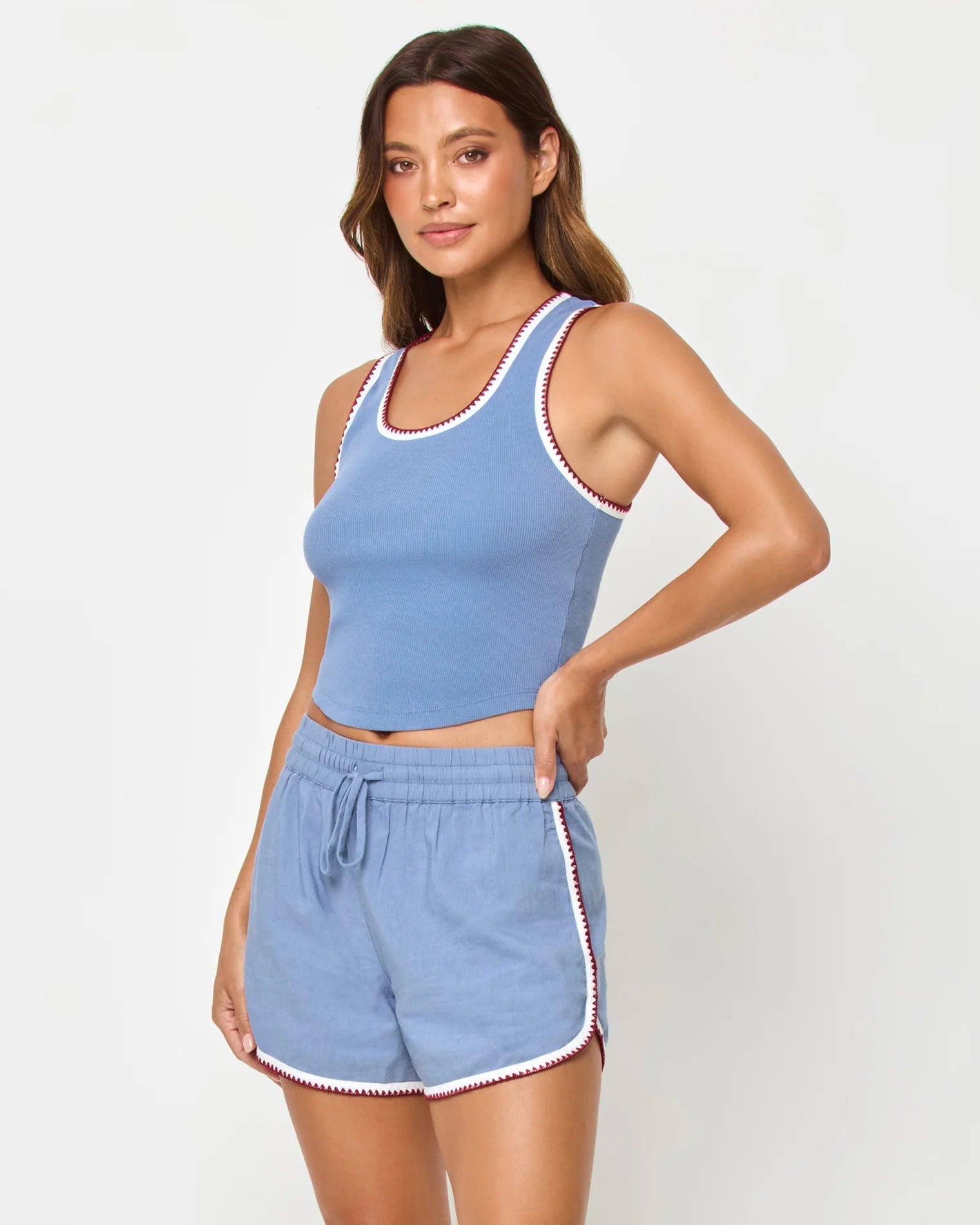 blue crop tank top with dark red trim