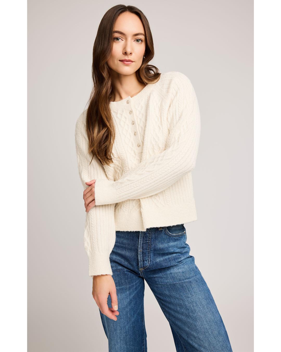 cream knit sweater with buttons half way down