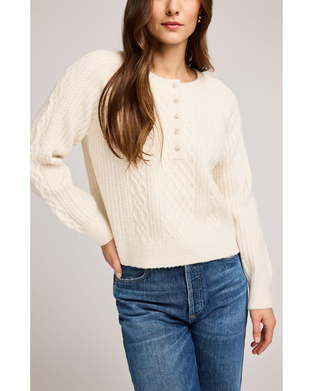cream knit sweater with buttons half way down