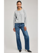 grey knit sweater with buttons half way down