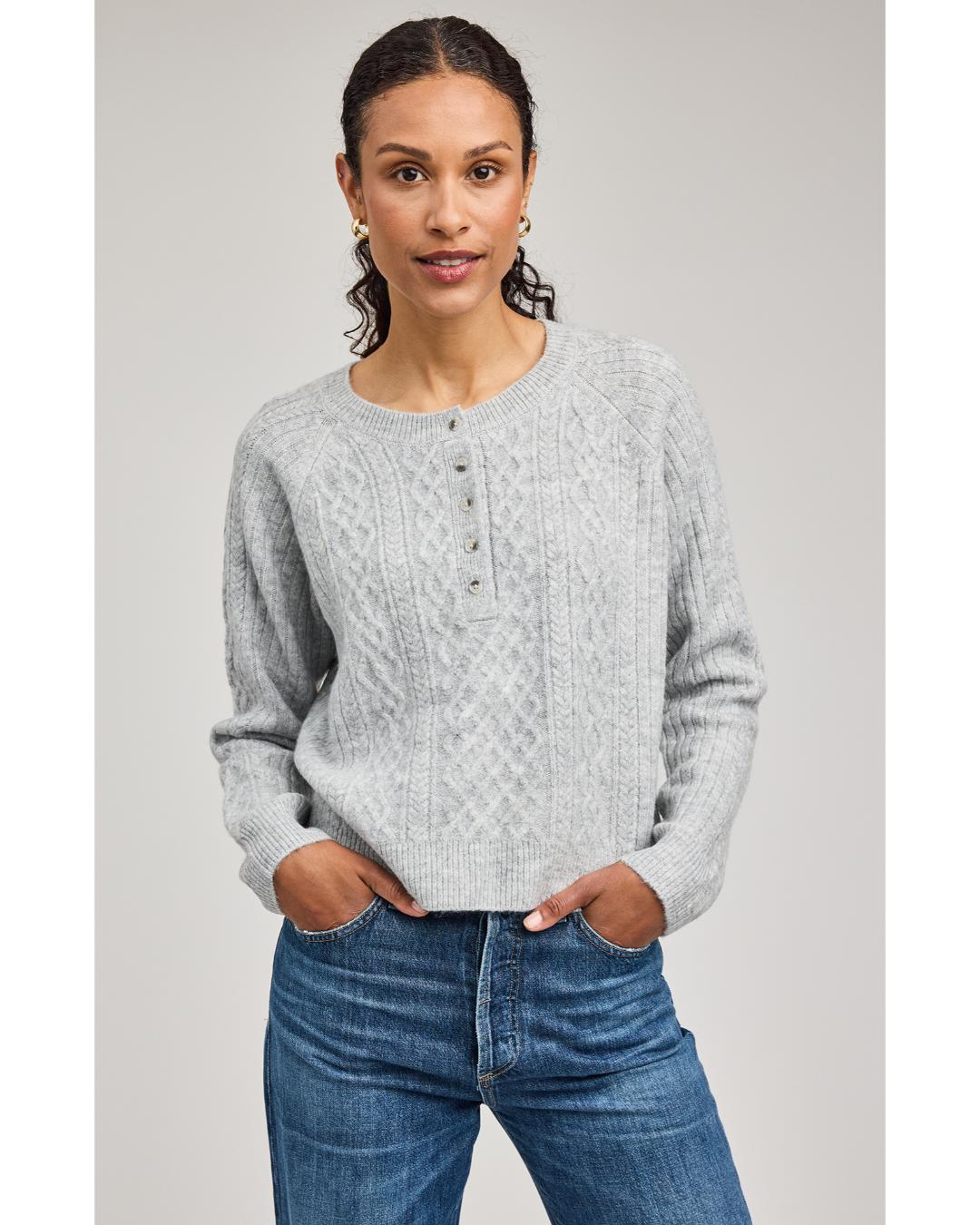 grey knit sweater with buttons half way down