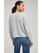 grey knit sweater with buttons half way down