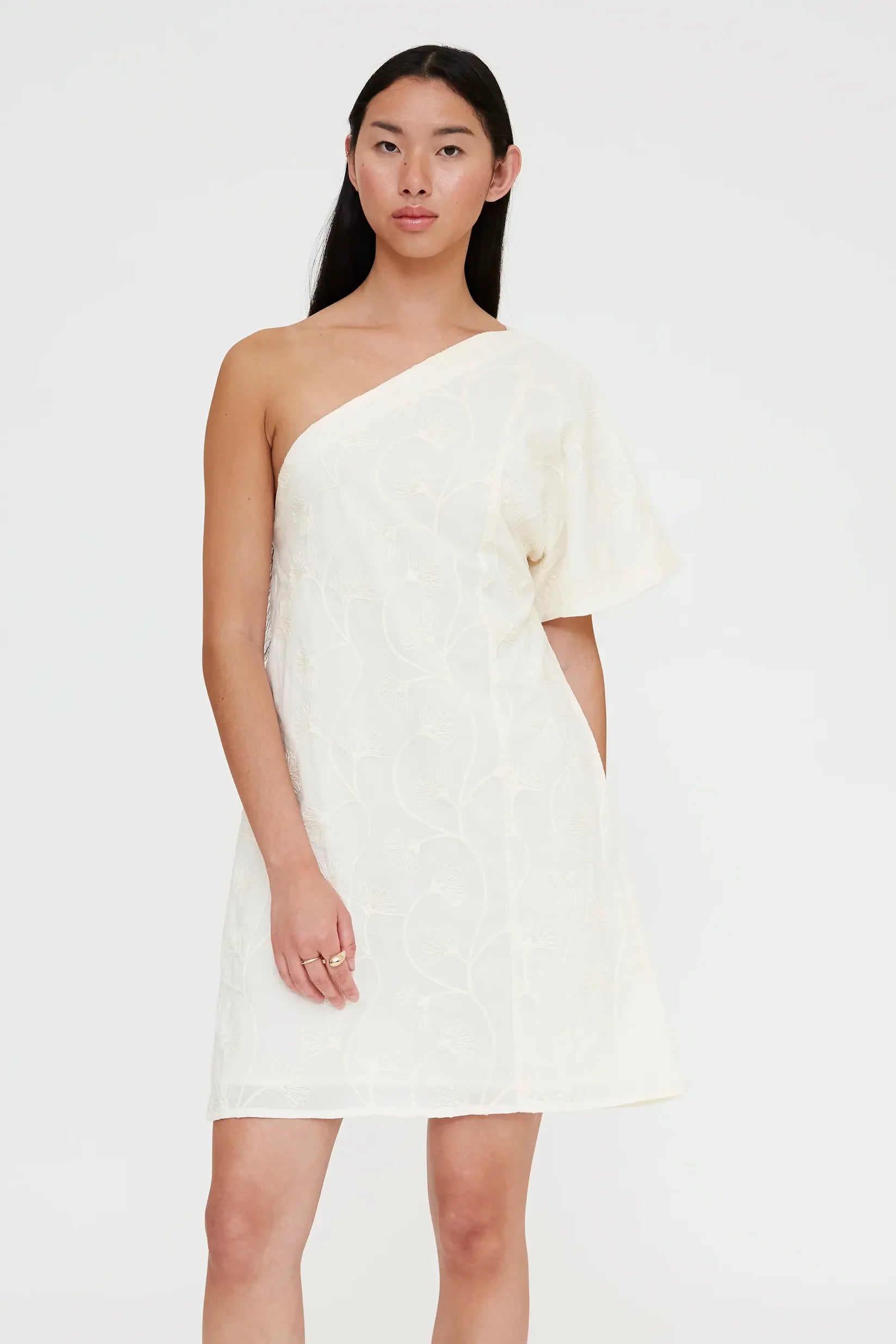 mini dress in off white with one off thee shoulder