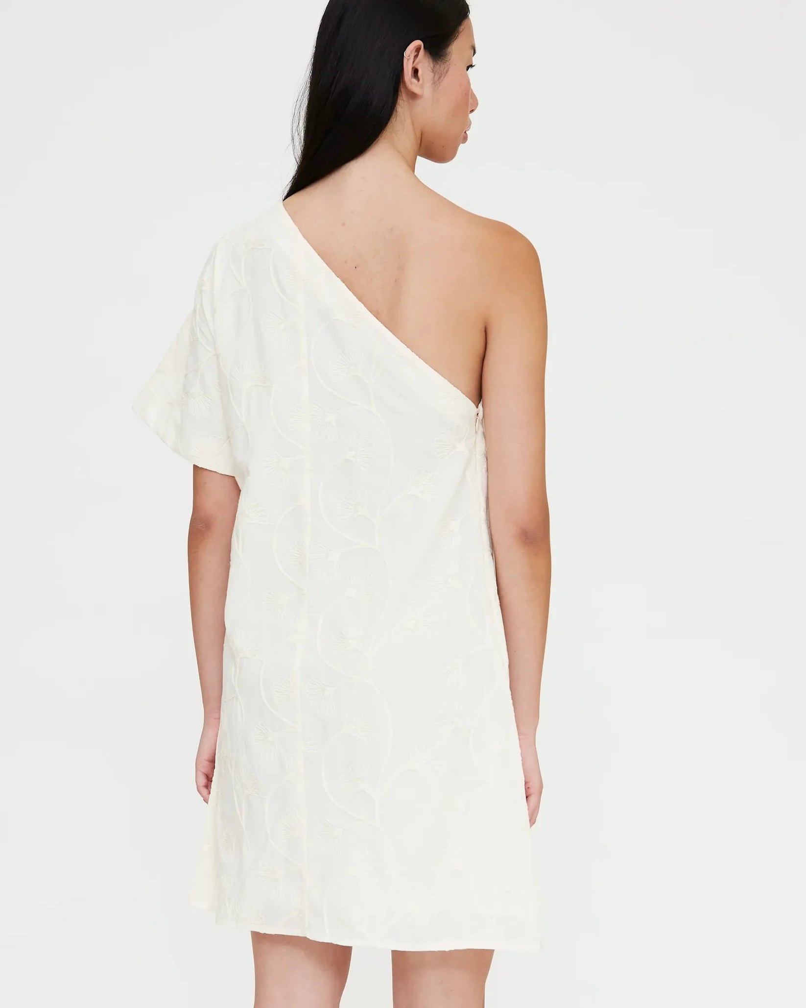 mini dress in off white with one off thee shoulder