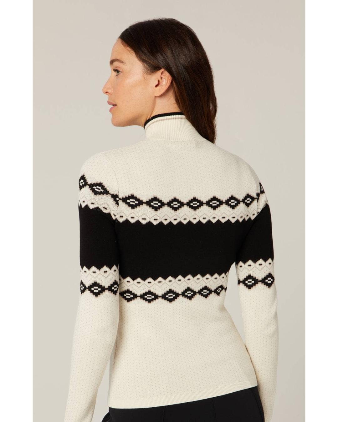 white and black sweater that says apres