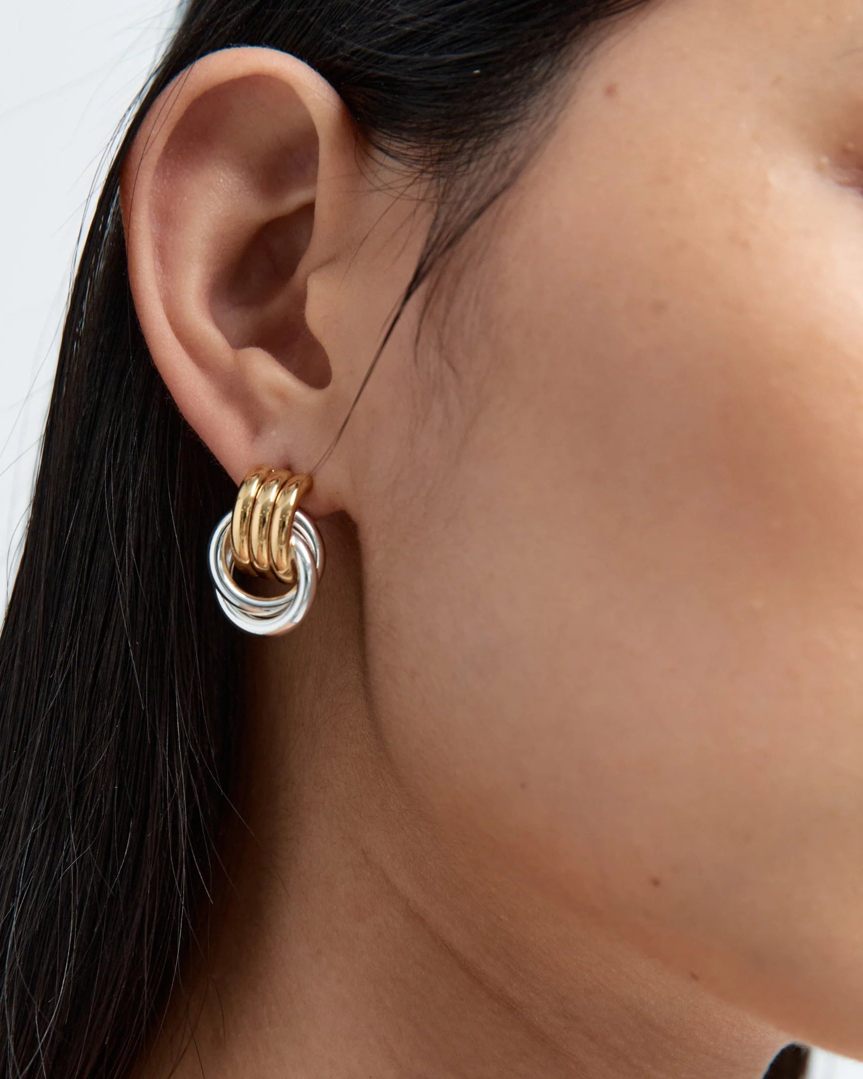 two tone knotted earrings