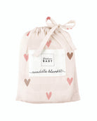 a picture of a baby swaddle blanket with hearts on it