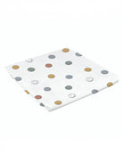 a picture of a baby swaddlle blanket with smiley faces on it