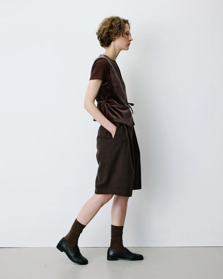 velvet brown vest with a tie
