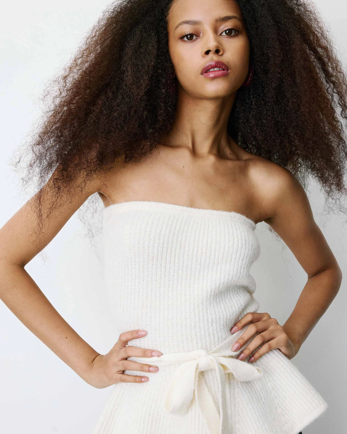 strapless tube top in white with peplum bottom and tie around the waist