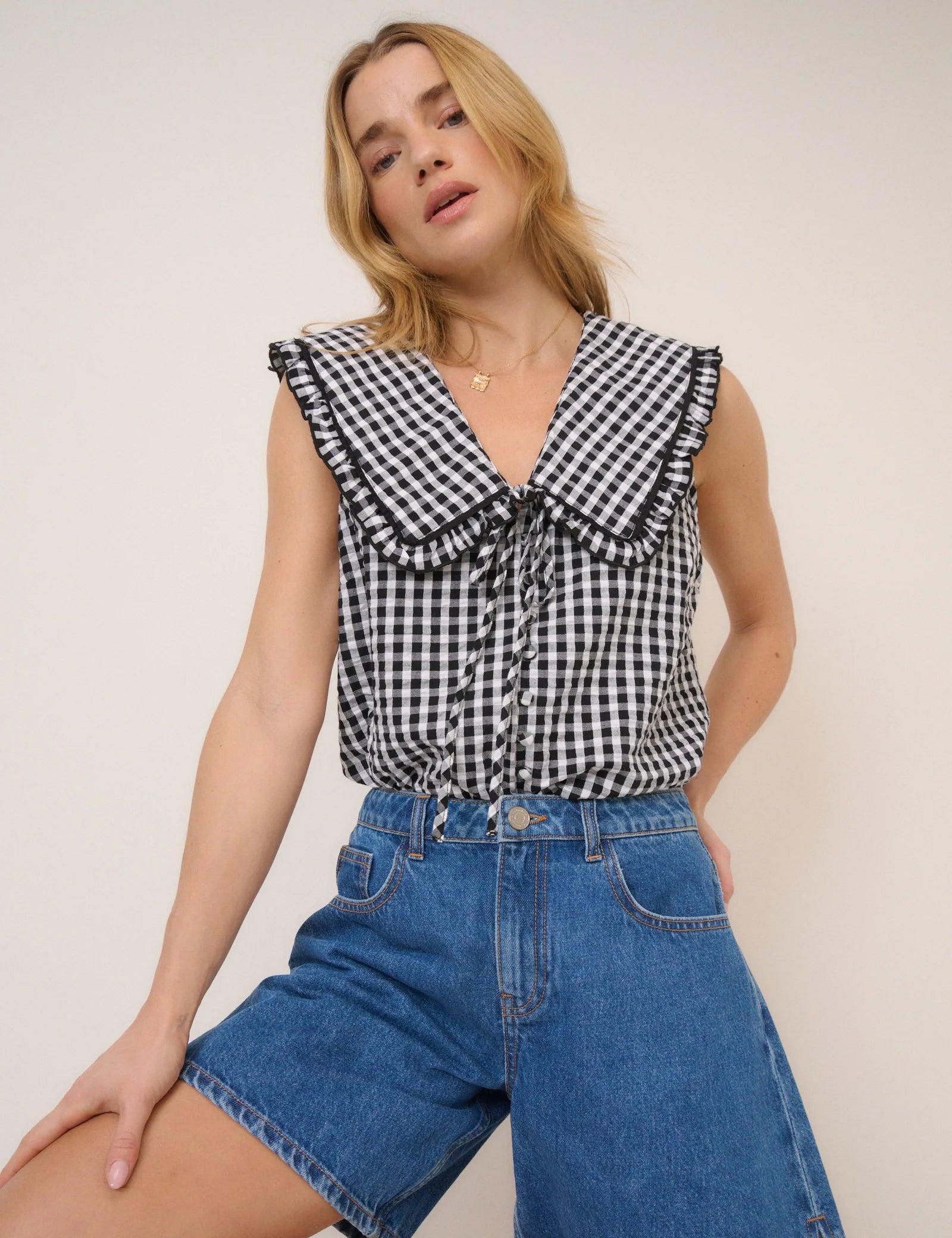 black gingham sleeveless top with large collar