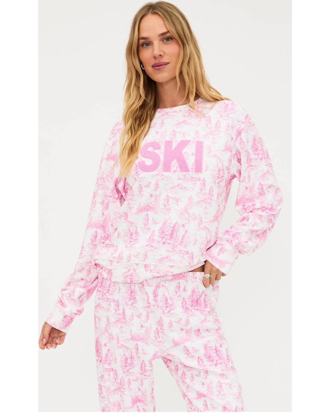 pink sweatshirt that says SKI