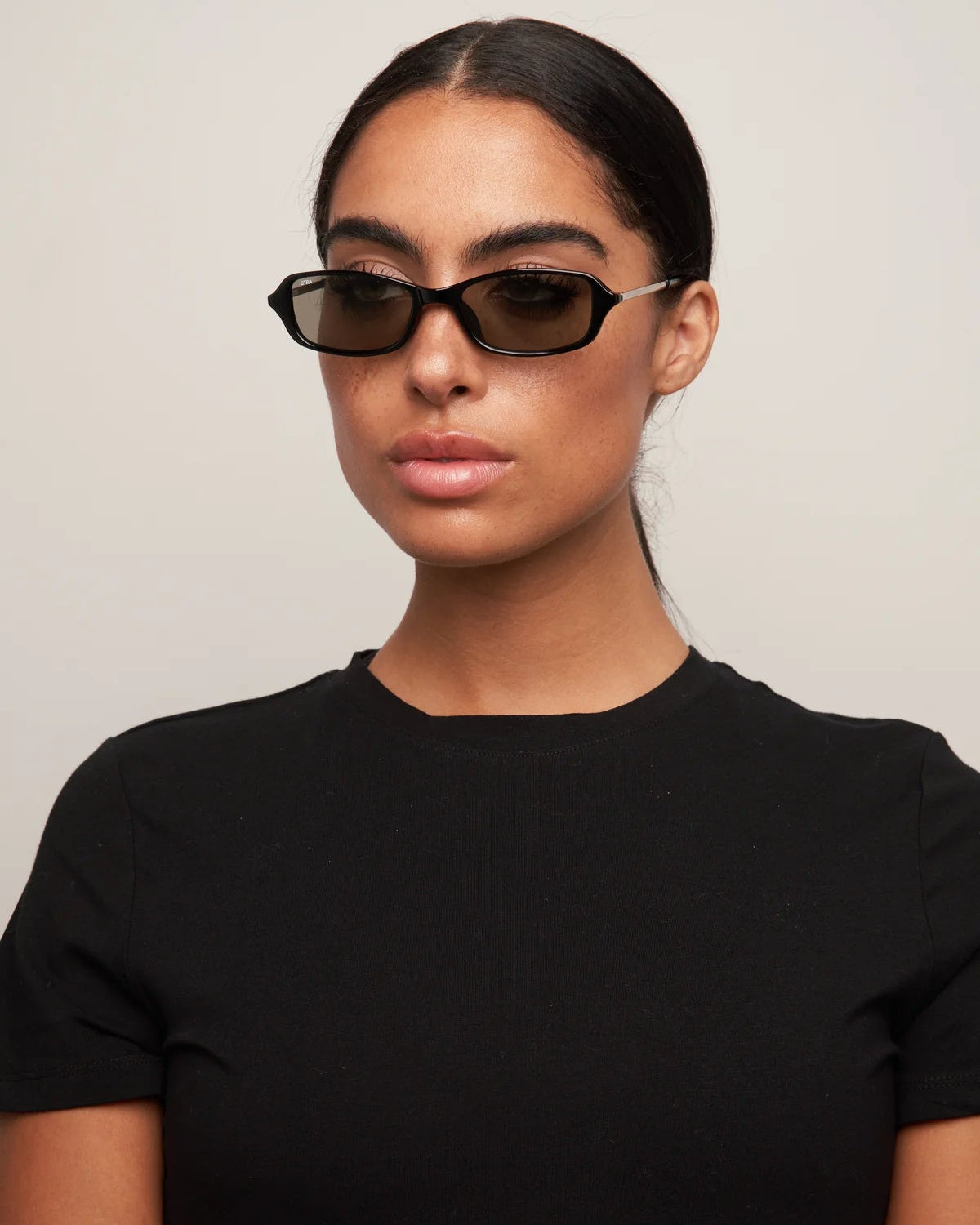 rectangular black sunglasses with grey lenses