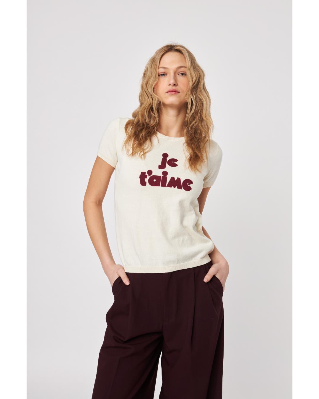 cream t-shirt with je t'aime written in red