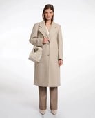 small crossbody bag in a beige faux fur