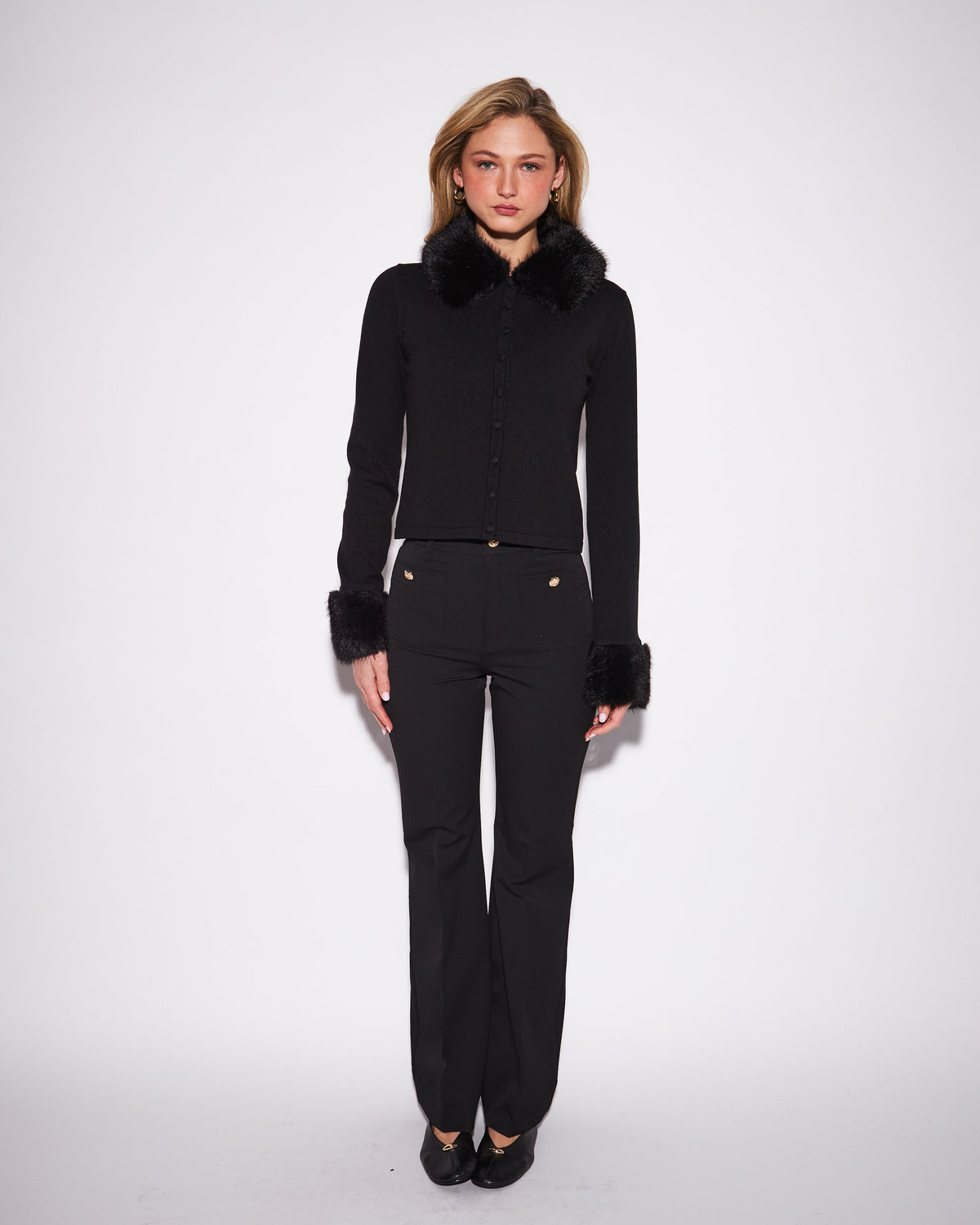 black knit cardigan with faux fur on collar and cuffs