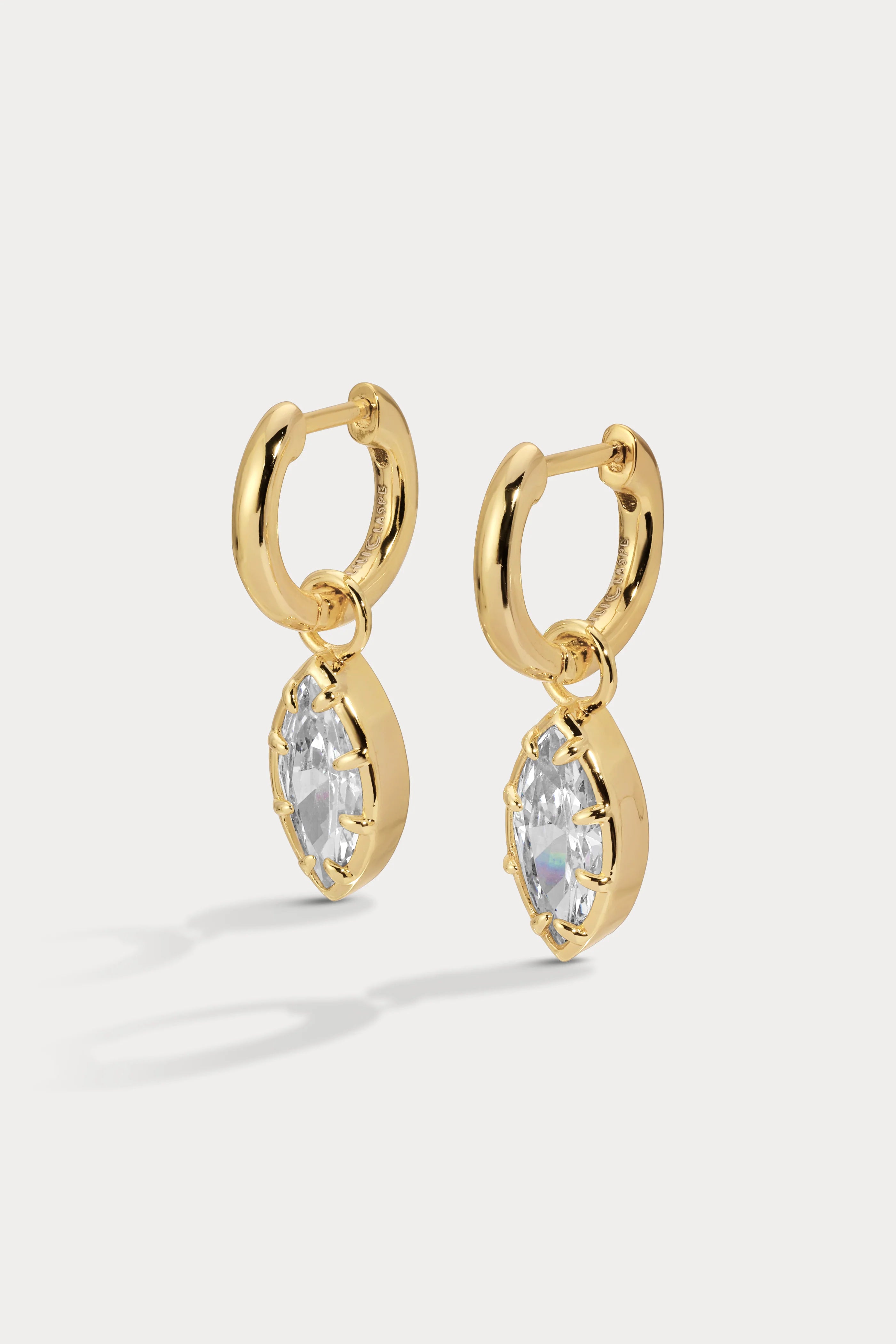 gold huggie earring with drop marquise diamond