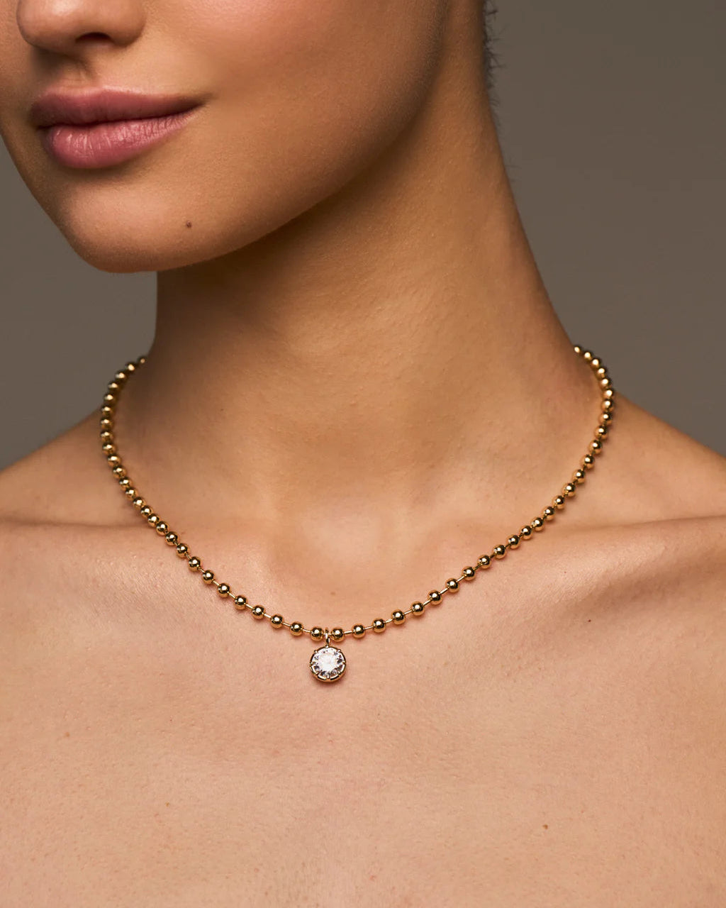 gold beaded ball necklace with diamond drop pendant