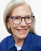 a woman wears a pair of blue square eyeglasses for blue light by Barner