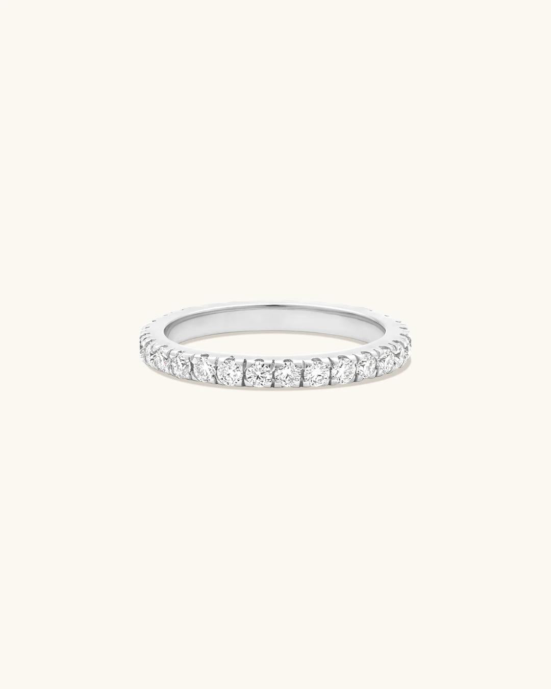 silver ring with diamonds all around