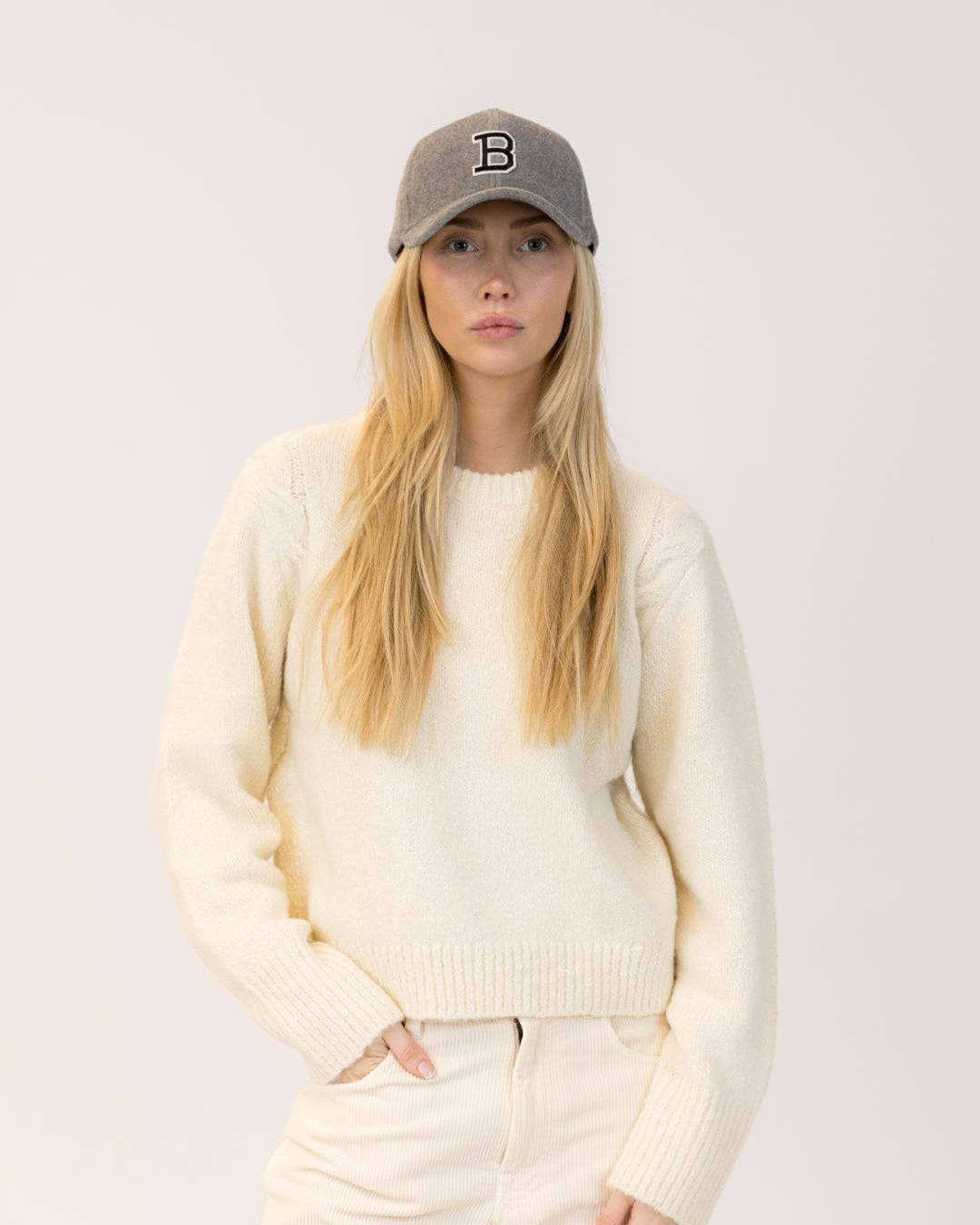 felt baseball hat with the letter B on it