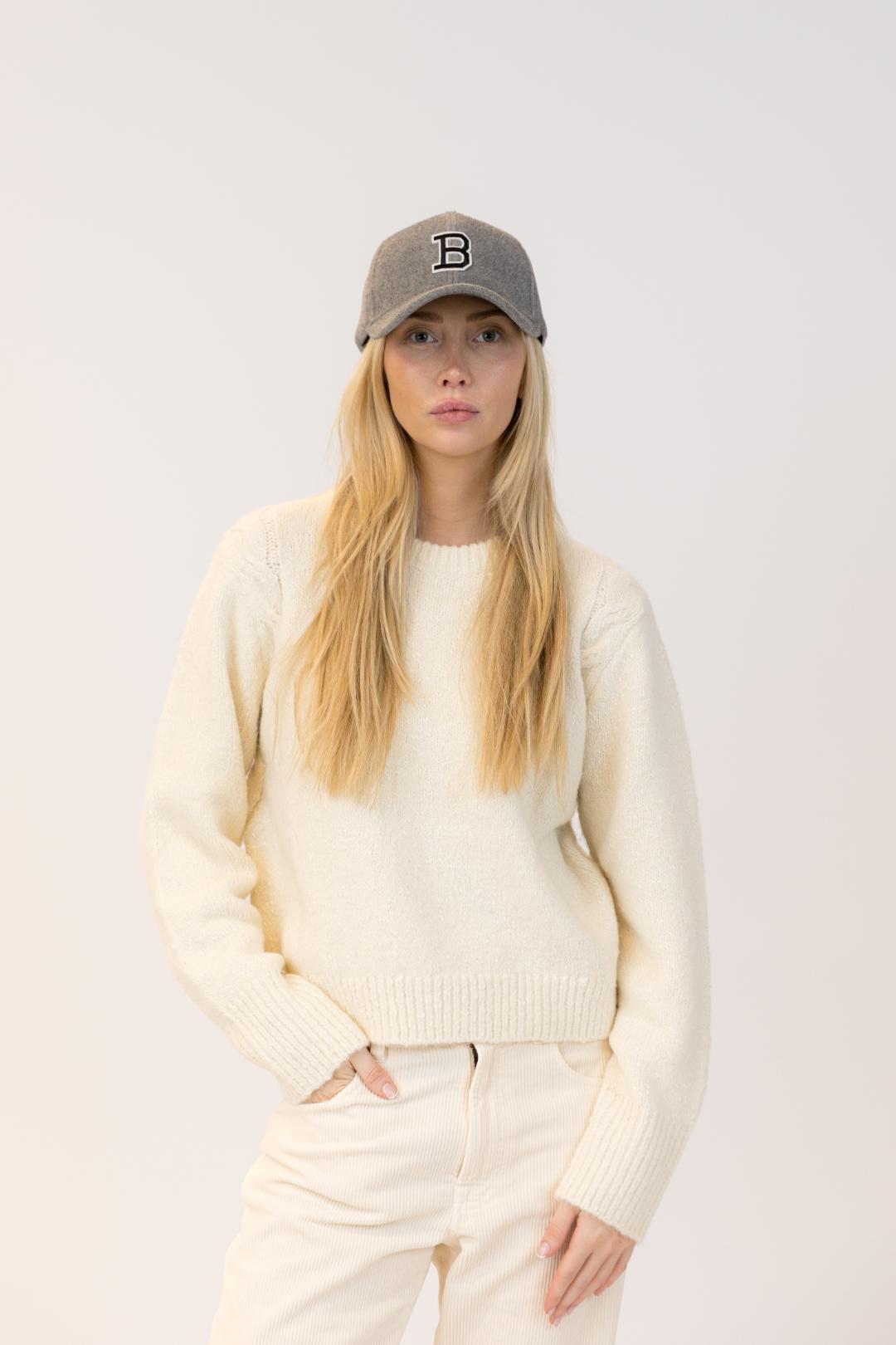 felt baseball hat with the letter B on it