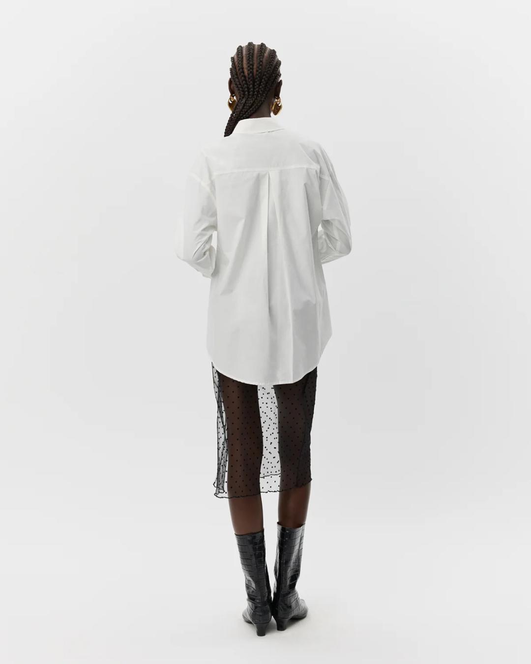 sheer black skirt with polka dots