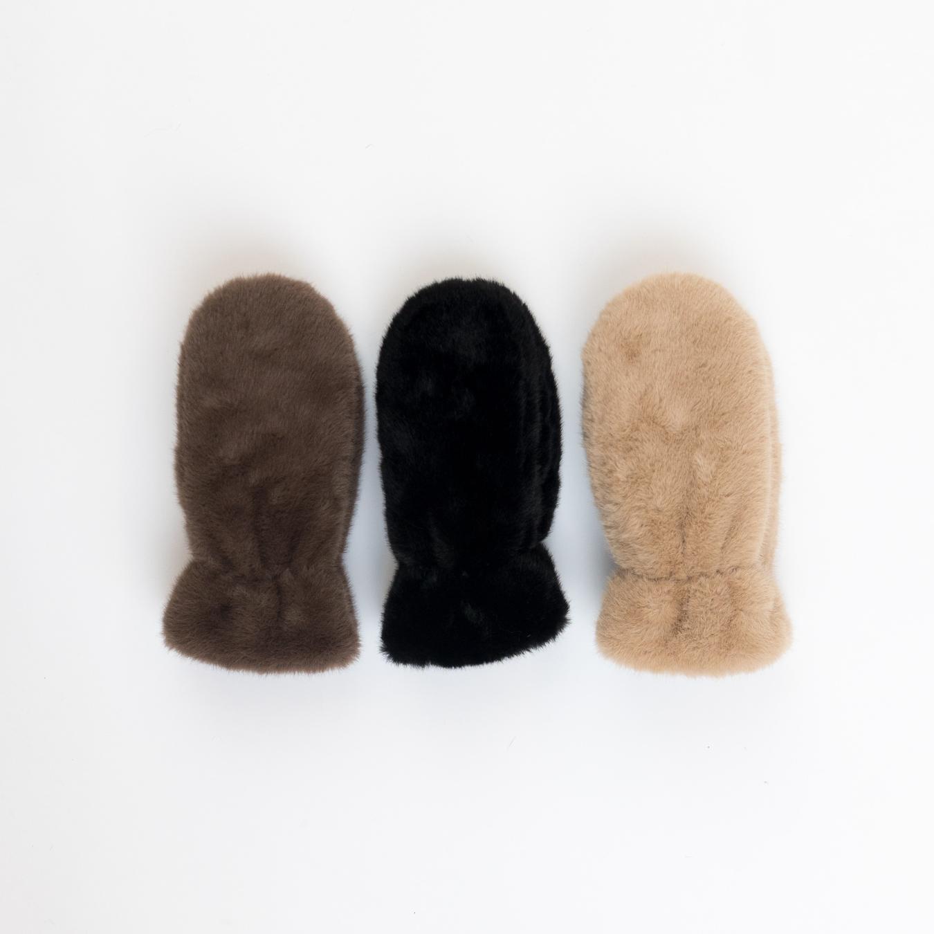 three fuzzy mittens in brown, black and camel