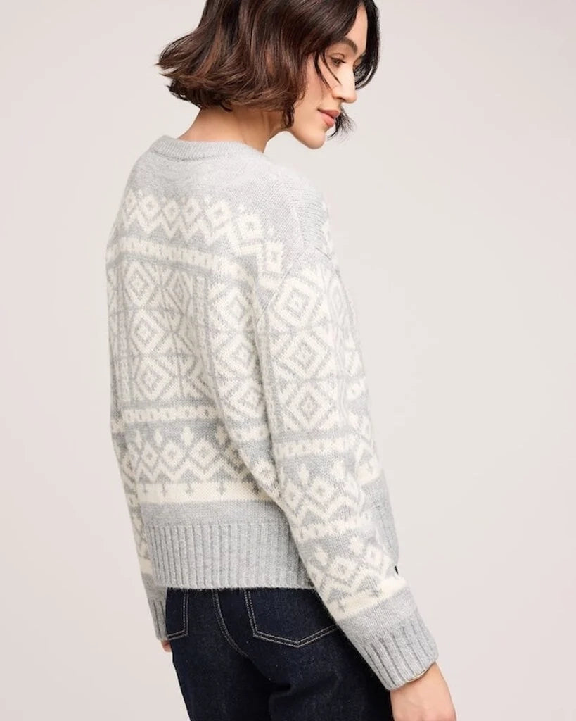 a woman wearing a cream and grey patterned fairisle sweater by gentle fawn