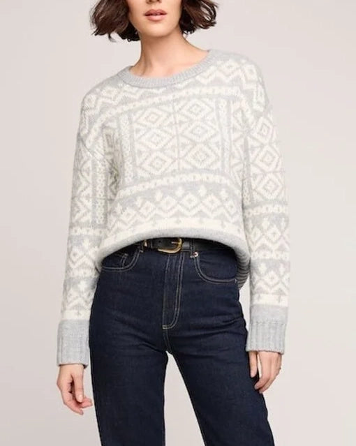 a woman wearing a cream and grey patterned fairisle sweater by gentle fawn