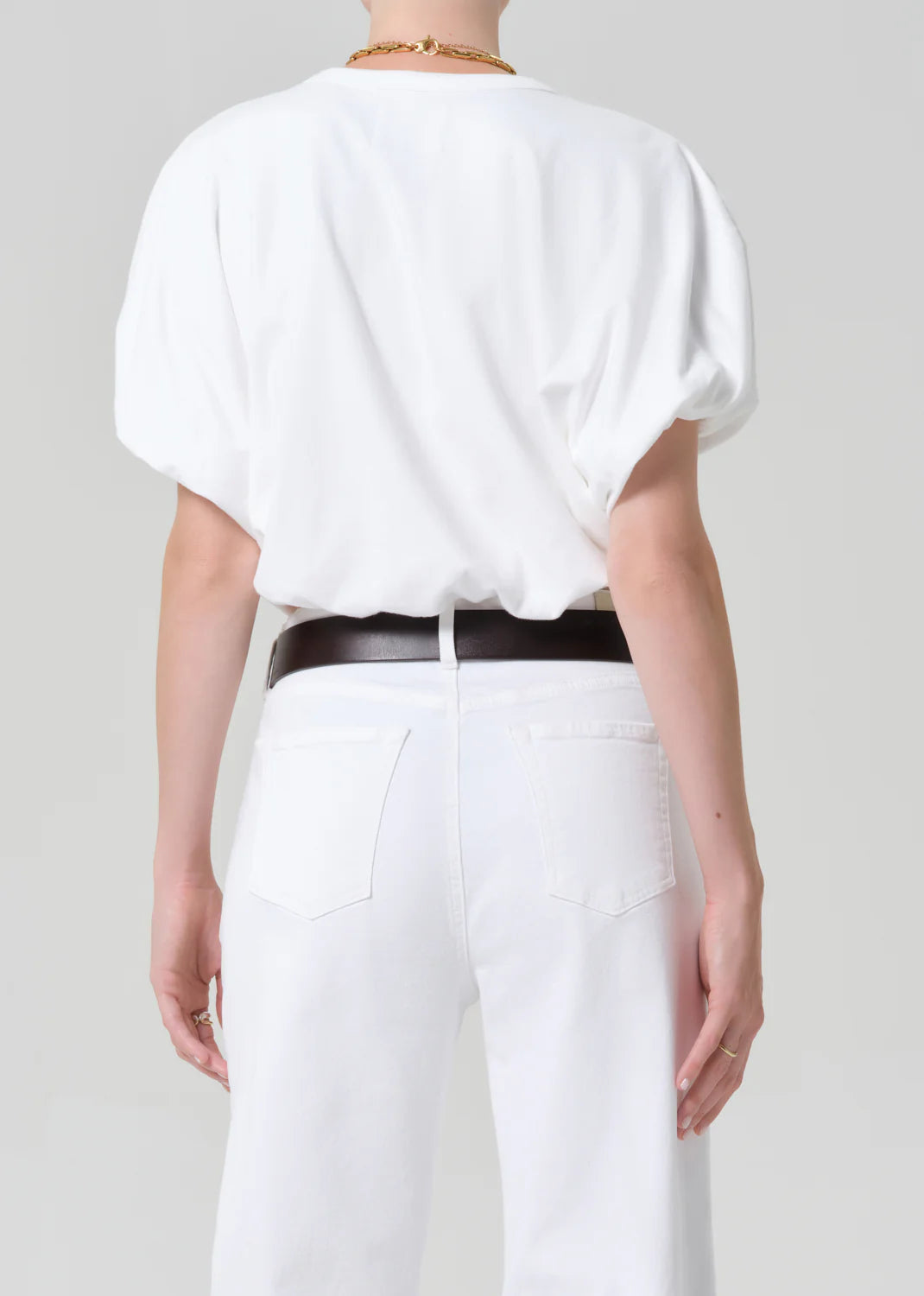white cropped short sleeve top with a bubble waist and sleeve