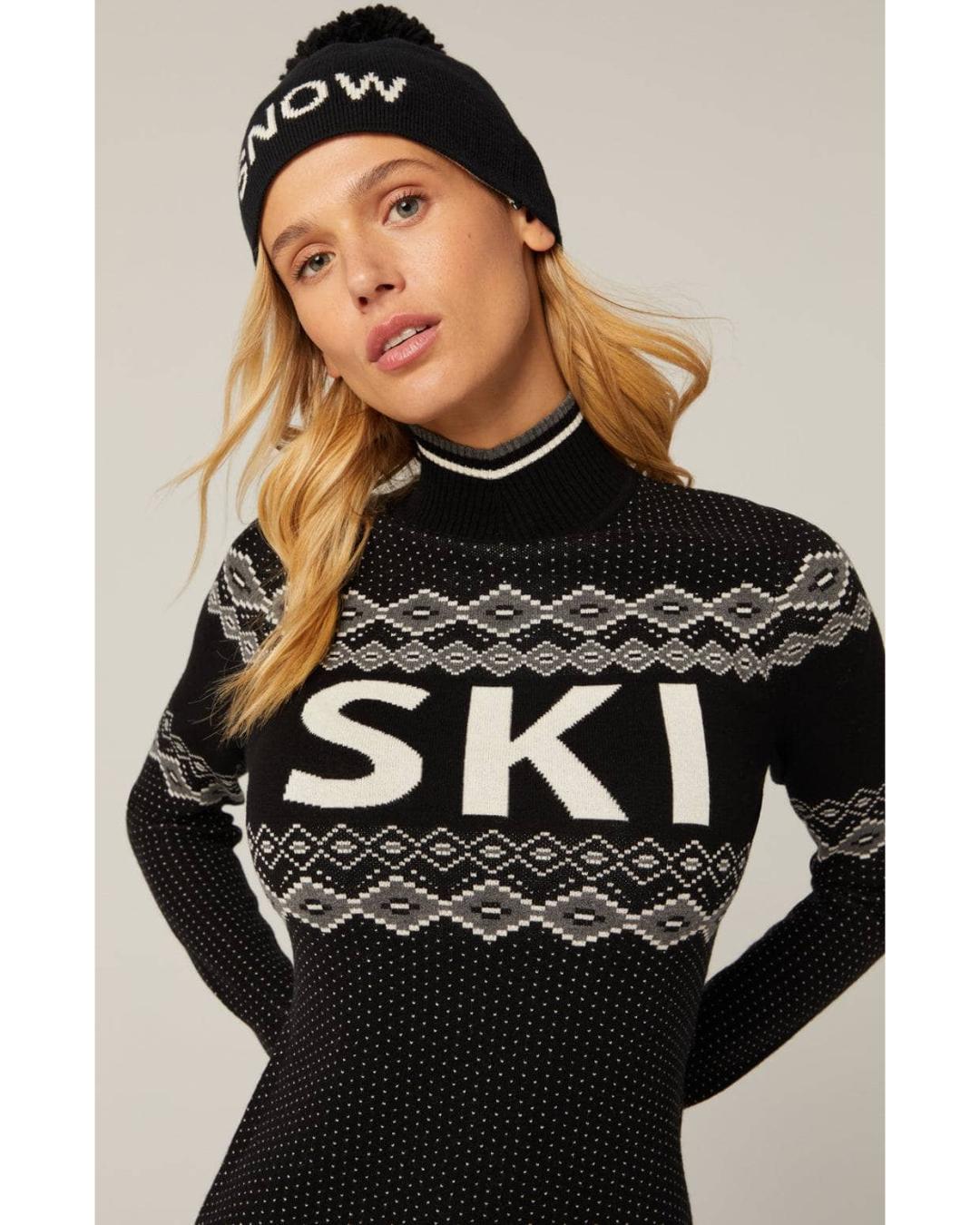 black turtleneck sweater with ski written in white