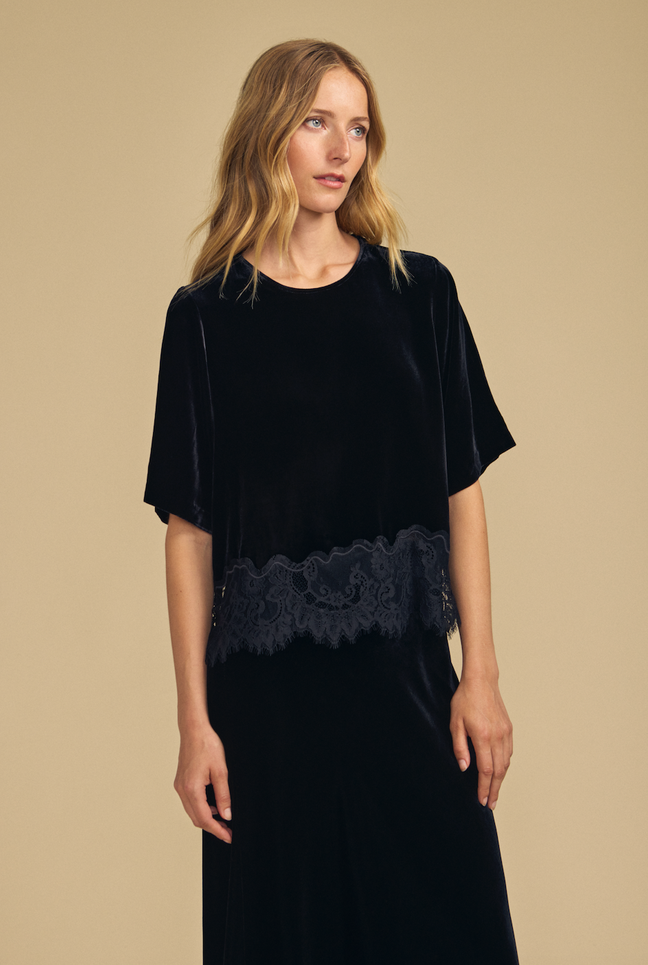 black velvet short sleeve top with lace trim on bottom