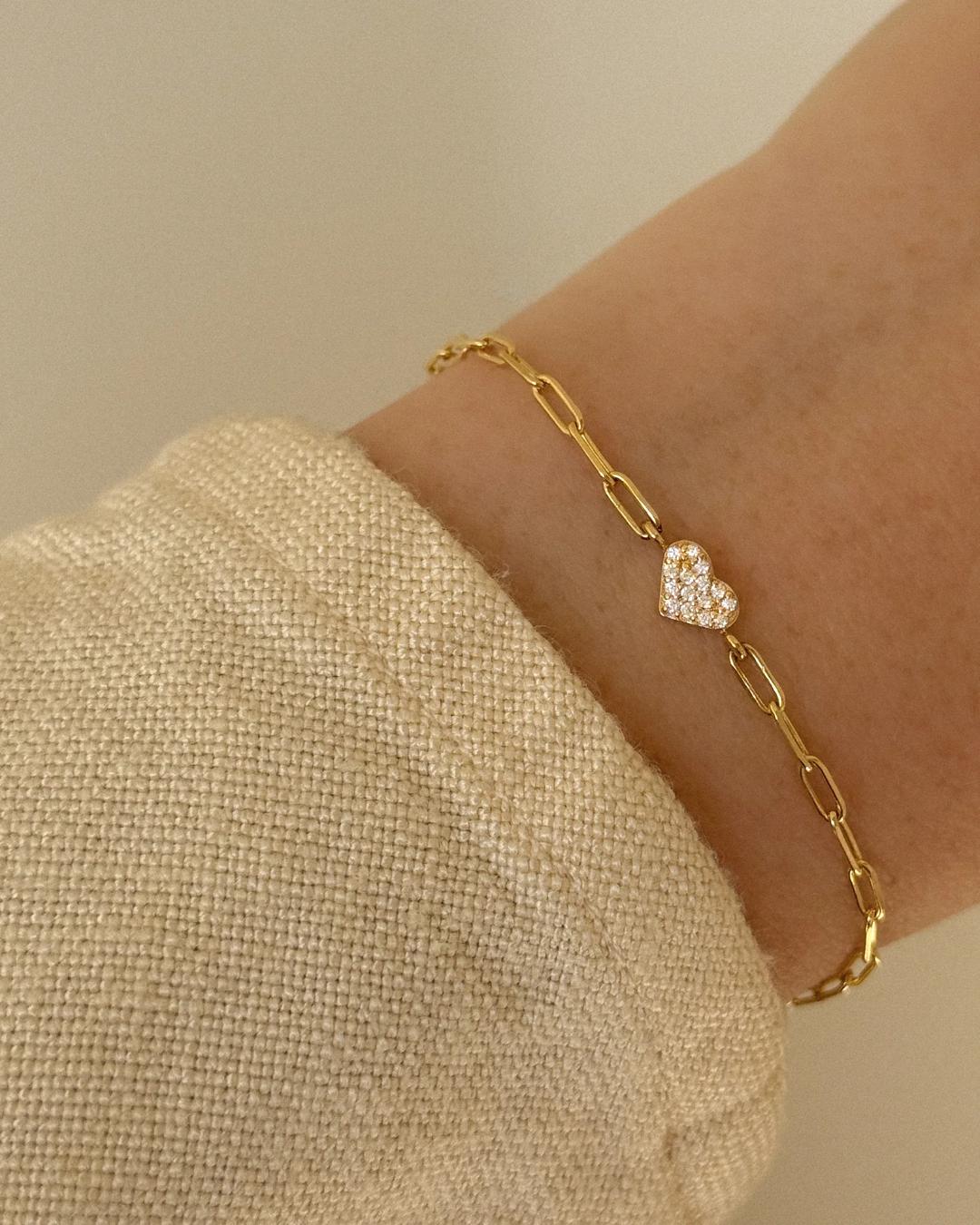 gold link bracelet with a heart
