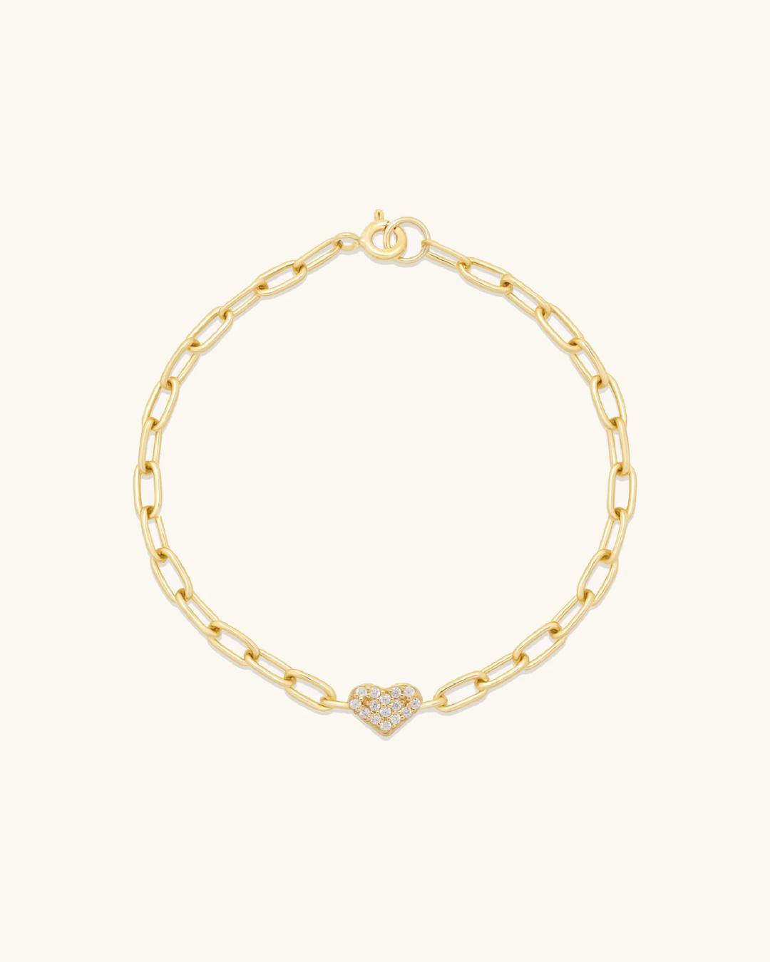 gold link bracelet with a heart
