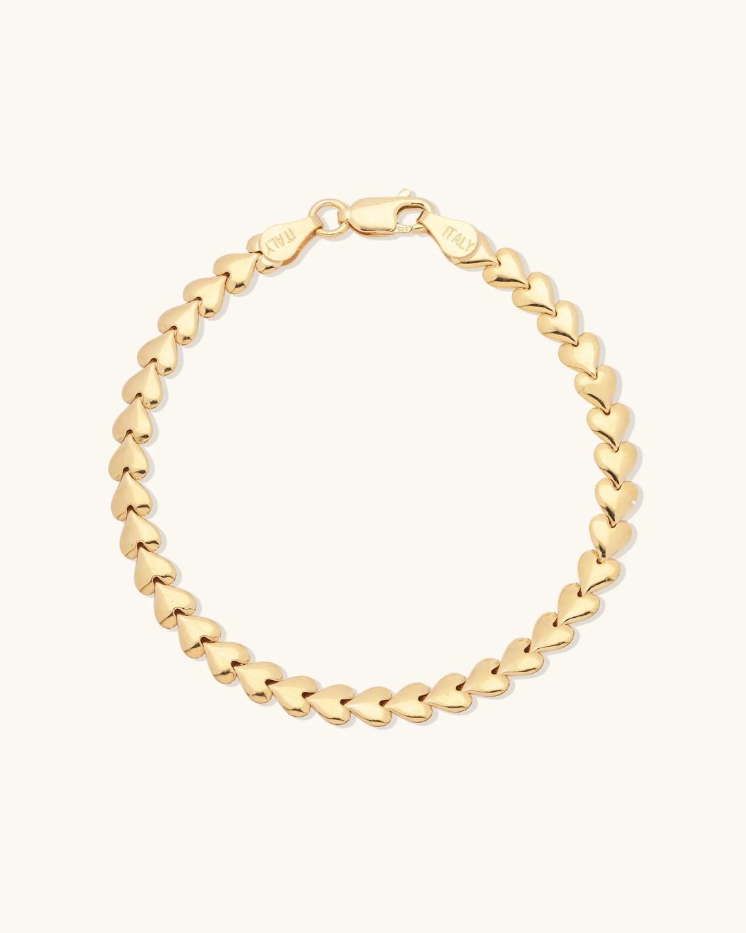 gold herringbone bracelet in the shape of hearts