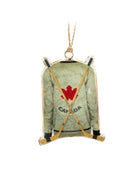 green hockey jersey ornament with a ale leaf on the back and two hockey sticks