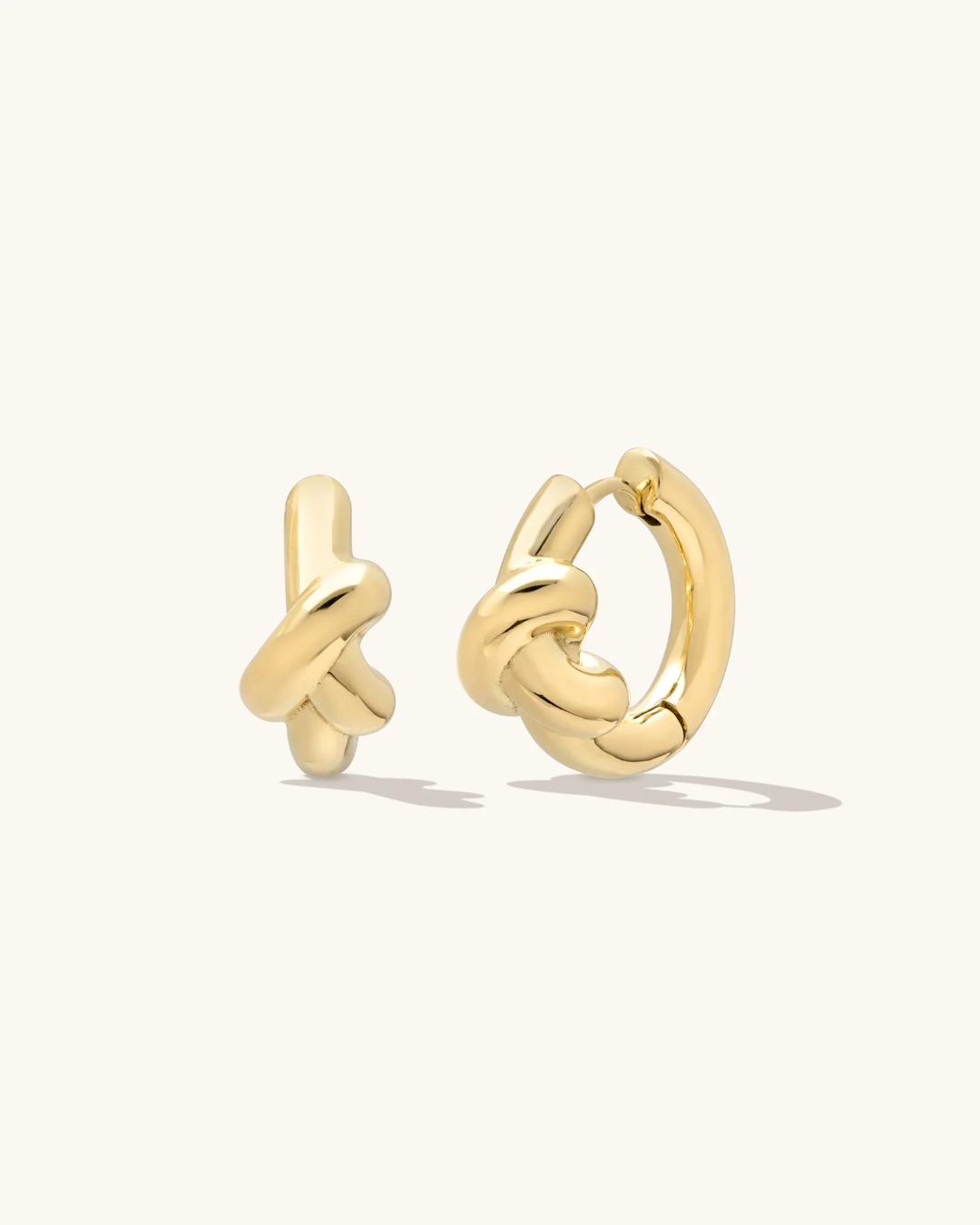 gold hoops in the shape of a knot