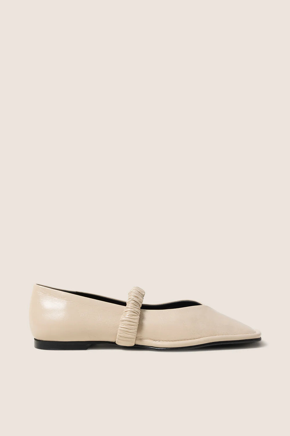 cream leather ballet flat with a square toe and a ruched strap
