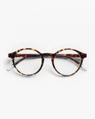 a pair of round framed tortoiseshell eyeglasses for blue light by Barner