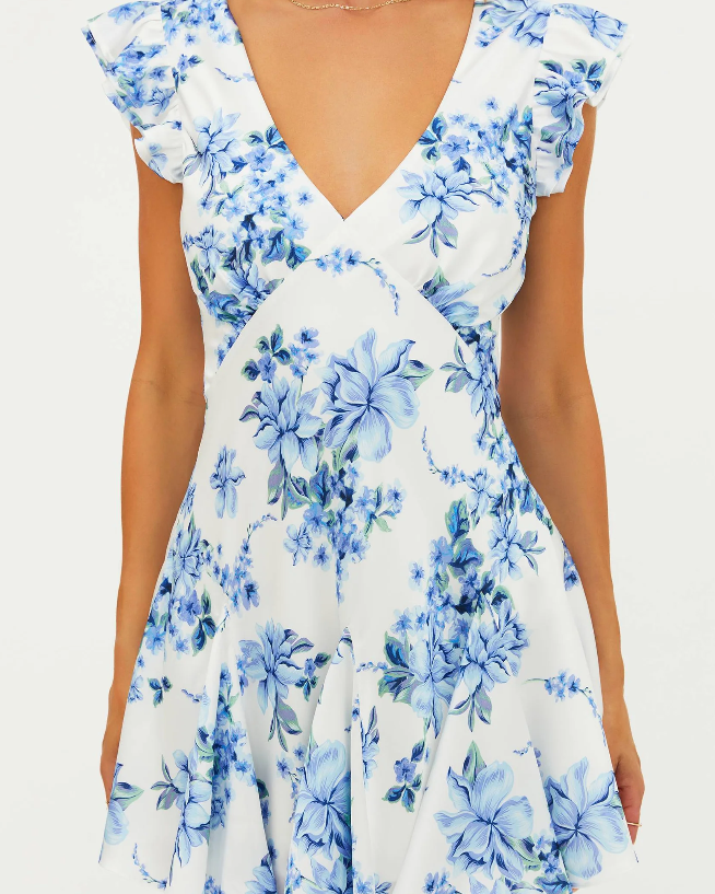 white mini dress with blue floral prints